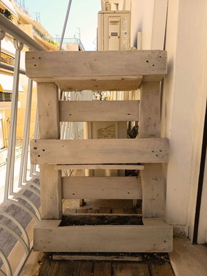 Handmade white wooden crate plant stand used