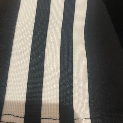 Adidas t shirt black like new with embossed chest logo