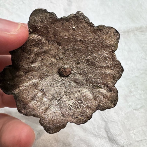 Base for objects used, bronze, several years old