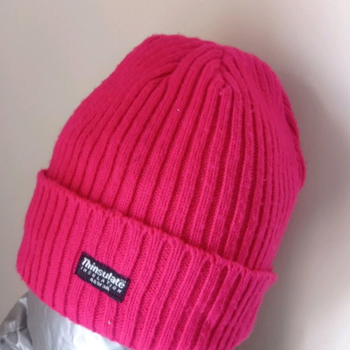 Knitted fuchsia Stamion hat with Thinsulate insulation slightly used