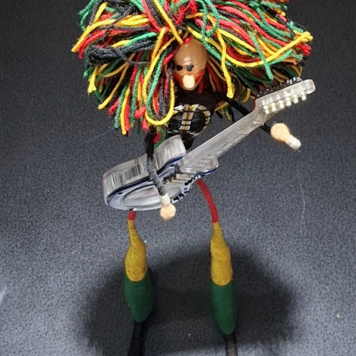 Vintage Table Clock Rastaman Figurine with Guitar like new