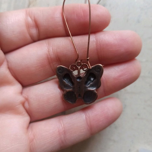Handmade metal butterfly and skull earrings new, brown
