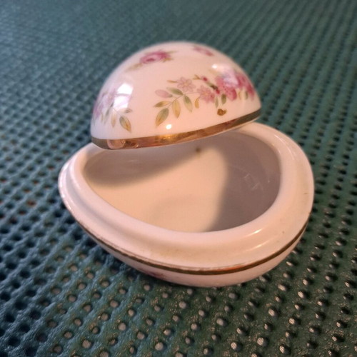Porcelain decorative container used, small egg with pink flowers