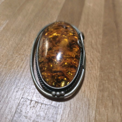Amber brooch like new, weight 26 grams, length 6.5cm