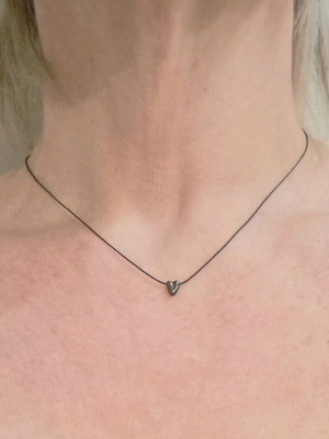 Silver oxidized heart necklace 925 on black cord like new