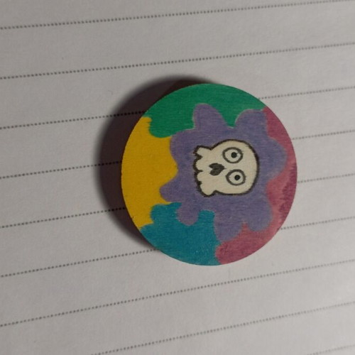 Handmade wooden magnet with skull design and acrylic