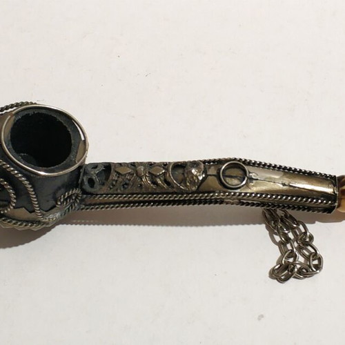 Decorative handmade pipe like new with intricate design
