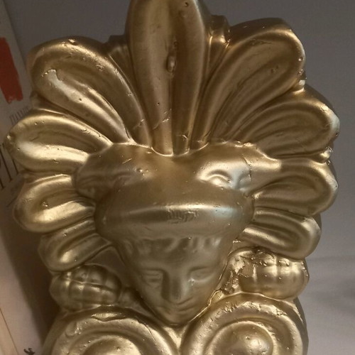 Acroceram with Hermes head like new, gold color