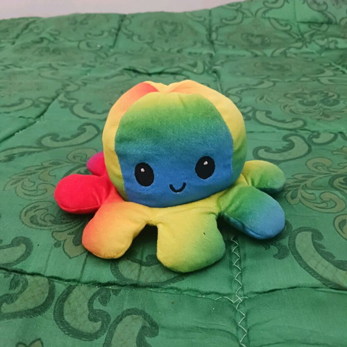 Colorful plush octopus happy or sad like new