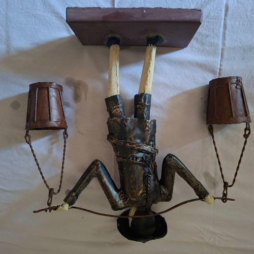 Asian Water Carrier Decorative Figurine like new, metal with wooden base