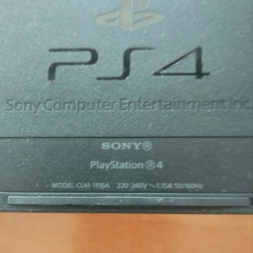 Sony PlayStation 4 Fat 500GB console with DualShock controller
