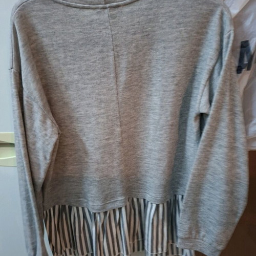 Long-sleeve blouse with ruffle hem gray new