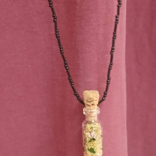 Handmade pendant glass bottle with gold glitter and beaded chain