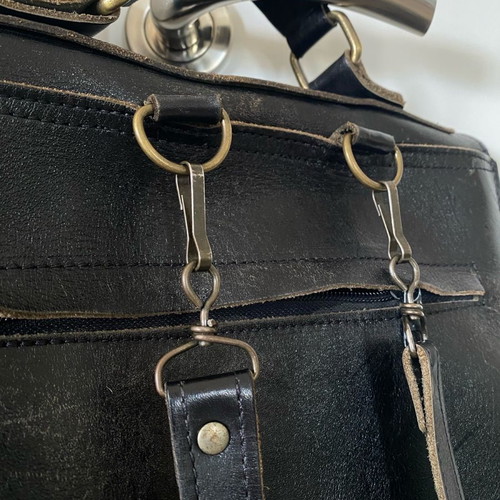 Leather messenger style backpack used, black