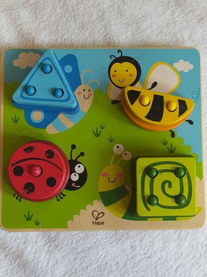 HAPE wooden sorting toy used with colors and shapes