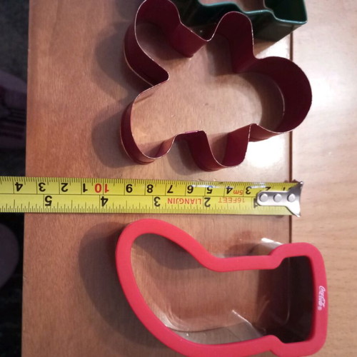 Tupperware cookie cutters like new, set of 3 with tree, boot and little person designs
