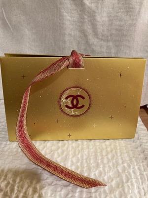 Chanel gift box new in gold color with ribbon
