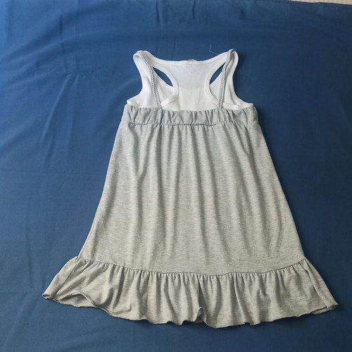 Children's dress used, gray sleeveless with ruffles and sporty back