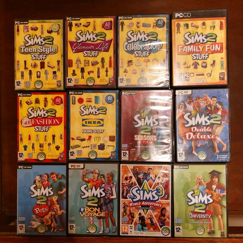 The Sims 2 & 3 collection of 15 PC games used with expansions and stuff packs