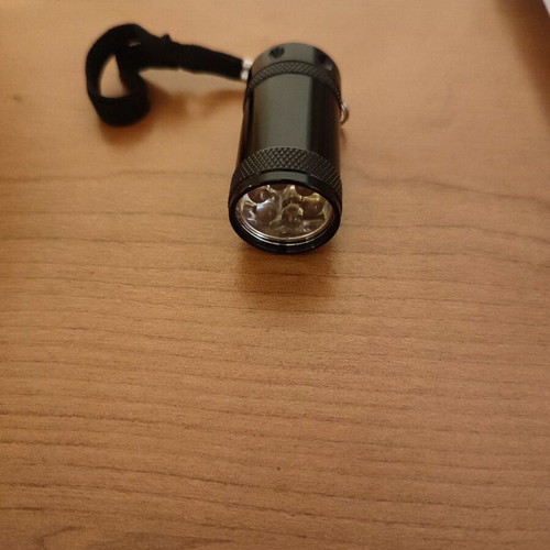 Mini Keychain Flashlight new with battery and box