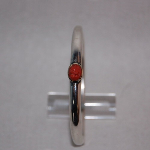 Silver bracelet with carved red coral and 18k gold setting, new