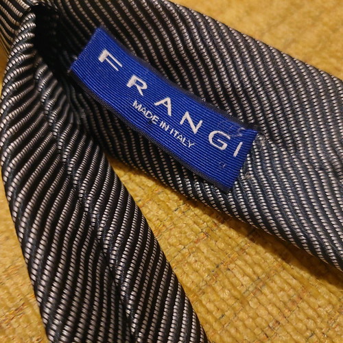 Women's striped tie gray black like new, shiny