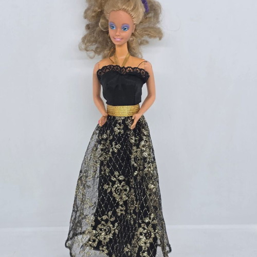 Barbie doll used