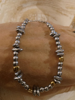 Steel bracelet new with gold and silver hematite