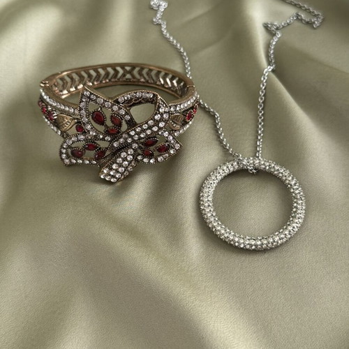 Hinged bangle and necklace charm set used