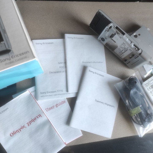 Sony Ericsson T715 box with original accessories and non-working device used
