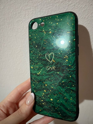 iPhone 8 case used with green design and gold details