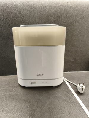 Philips Avent 4-in-1 sterilizer used with gift tongs