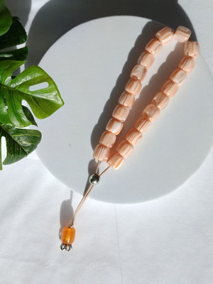 Komboloi with peach-orange cubic beads like new