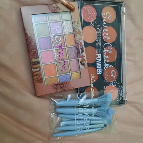 Cosmetics new, blush and eyeshadow palettes, brushes and nude lip pencil