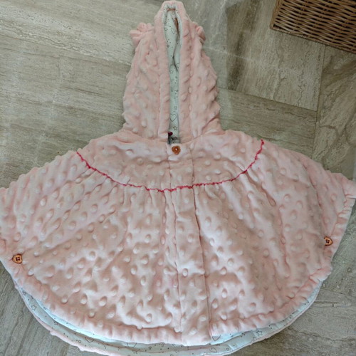 Baby poncho for 9-month-old girl, unused
