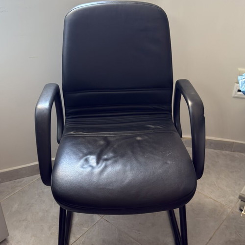 Leather office chair used with soft seat and armrests