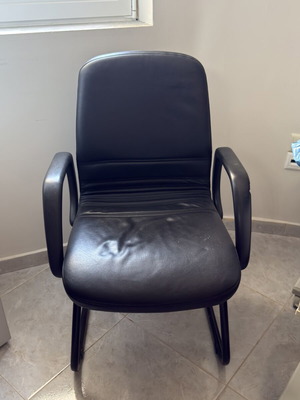 Leather office chair used with soft seat and armrests