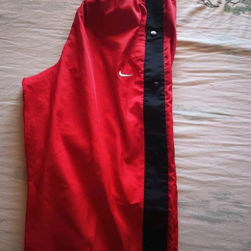 Nike sports pants with side buttons like new, black and red, size L