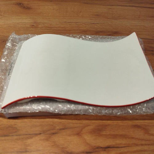 Designer serving platter with wave design, unused