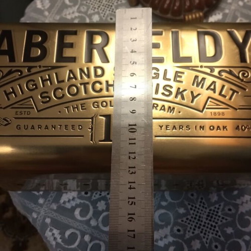 Metal Bottle Case like new with collectible bottle