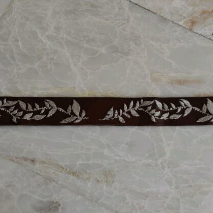 Belt with designs used Accessorize, size 95, white and brown