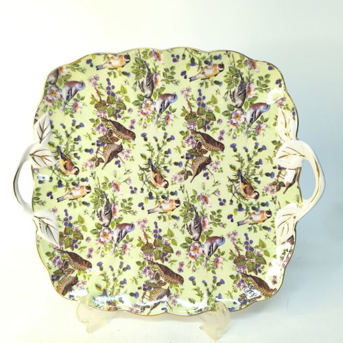 Porcelain serving platter decorated with birds and flowers like new