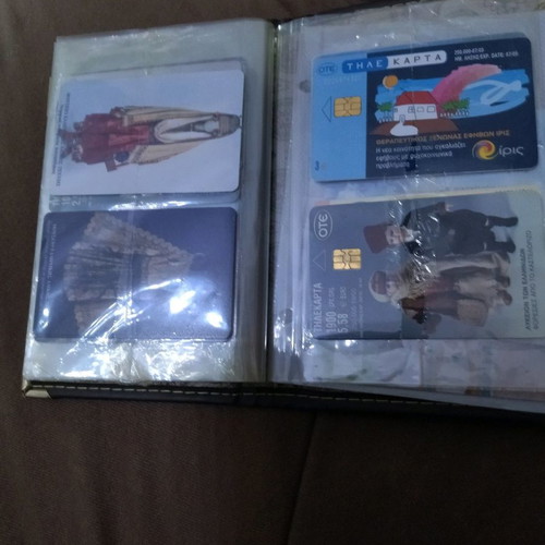 Collectible phone cards used with album