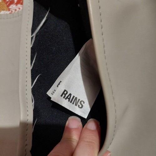 Rains backpack used, gray color, small inner pocket