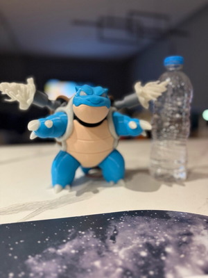 Pokemon Blastoise figure with glow-in-the-dark 3D print