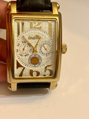 Oxette γυναικείο ρολόι μεταχειρισμένο σε χρυσό χρώμα με δερμάτινο λουρί