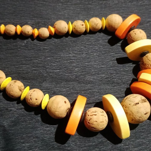 Alternative necklace made of cork with orange beads used