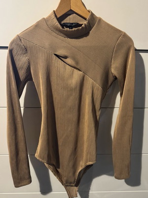 Ckontova beige bodysuit size S like new with chest opening