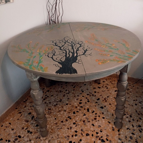 Round table with painted design, chalk paint