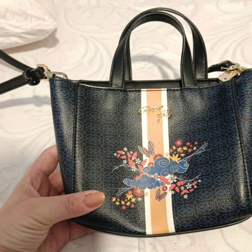 Axel crossbody bag black like new, convertible to handbag